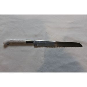 Vintage 1986 Precious Moments Samuel J. Butcher Cake Knife 13" “Sharing Our Joy”